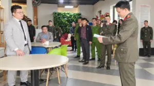 Hồ Quốc Thân, Tổng giám đốc Công ty Triệu nụ cười, chuẩn bị hầu tòa trong vụ án liên quan đến hoạt động kinh doanh đồng tiền QFS.
