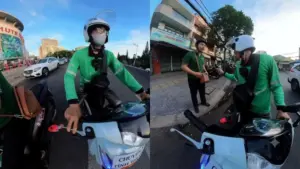 Tài xế công nghệ giúp du khách Trung Quốc hỏng xe đẩy bộ 1 km và nhất quyết không nhận tiền cảm ơn, tạo ấn tượng đẹp với khách quốc tế.